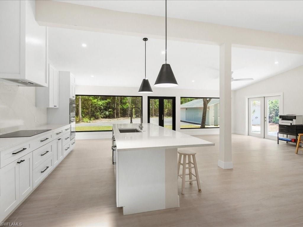 Photo of 6800 Bottlebrush LN, NAPLES, FL 34109 (MLS # 225077994)