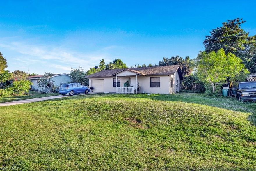 This concrete block built 2 Bedroom / 2 bath / 1 car garage single family home is located in the heart of Golden Gate. Plenty of room in the back yard for a pool, tiki or for parking a trailer, boat or RV. 12 other similar homes are being sold in the same area, great for investors on all 13 homes or sold individually.  These homes are full of potential, very affordable with todays interest rate. Don’t wait as these homes will not last.