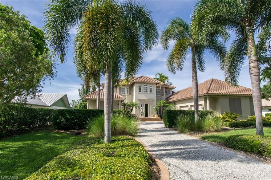 Paradise found!  Lakefront living and walk to the Beach.  Watch the sunrise on your patio overlooking the pool and spa surrounded by lush tropical landscaping overlooking the lake. Bike to the Park Shore beach park, rent a paddle board on Venetian Bay or enjoy the upscale shops and restaurants at Venetian Village.  This  estate home offers you all of this plus a first floor master suite that opens to the pool, crown molding in every room and coffered ceilings in the main living area and almost 4,000 sf of living space. Stunning French doors w/designer drapes are perfect for indoor/outdoor living. Oversized Mexican tile throughout main living & functional floor plan, this home allows for elegant, yet low maintenance living.  You'll love cooking in the ergonomically designed kitchen with plenty of storage, a large granite island, and breakfast bar w/plenty of room for guests to gather while you’re entertaining. Upstairs you will enjoy a spacious recreational room with a wet bar & 2 large bedrooms, each with a full bath. This prized lot features an eco-friendly crushed shell driveway that adds curb appeal and plenty of room for parking w/a 2 car garage.  Make this beauty your home!