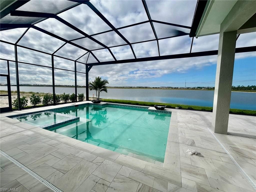 Photo of 9448 Loquat LN, NAPLES, FL 34114 (MLS # 226015586)