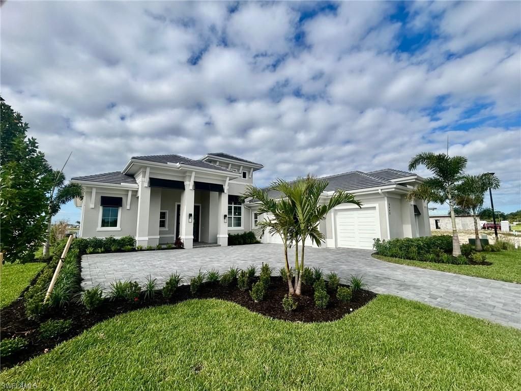 Photo of 9448 Loquat LN, NAPLES, FL 34114 (MLS # 226015586)