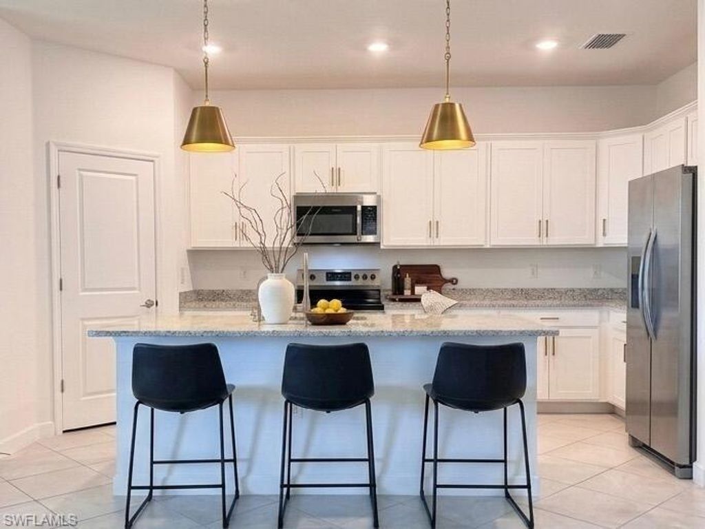 Photo of 13899 Hunter Oak DR, FORT MYERS, FL 33913 (MLS # 226013978)