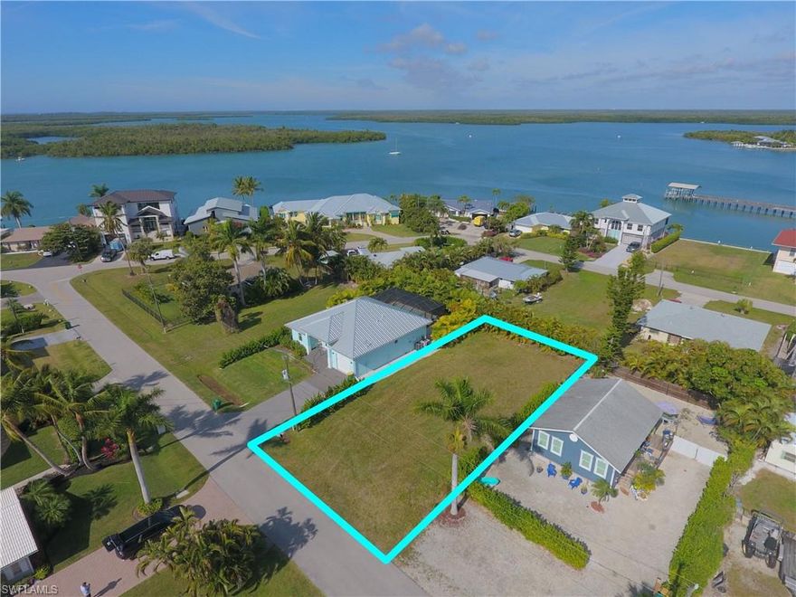 Great neighbors and a great location make this inland lot the perfect place to build your dream house.  Located on the beautiful Isles of Capri.  Build a single level house for easy access to the pool or build up to three stories and take advantage of the island views.  Get your flip-flops, your sunglasses, hop on the golf cart and enjoy island living.  Isles of Capri is a tropical island that boasts and abundance of wildlife, four great restaurants and three marinas.  Located one mile from Marco Island & only 20 minutes away from Downtown Naples with its sophisticated shopping & five star dining.  Our area is famous for its white sand beaches, world class fishing & boating and fantastic golfing.  Capri is the perfect place to sit back, relax and unwind.