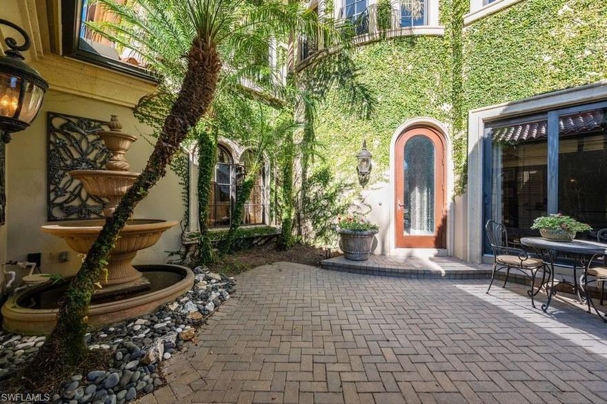 Welcome to the Ritz Carlton Golf Resort at Tiburon... noted for its superb location within minutes to world-class beaches, shopping and restaurants. This stunning home is being offered turnkey and it is located in the private enclave of Serafina- on the cul-de-sac and overlooks the 6th fairway of the Gold Course. Upon entering the gated courtyard, you will be welcomed by the beautiful entry door leading to a private den and powder room on the right. The combined living and dining room space with dramatic ceilings provides the perfect venue for guests to mingle. Beyond is the family room and chef's kitchen for an informal gathering. Pocketing glass doors lead to the screened lanai, outdoor kitchen and bathroom with shower. The pool with raised spa is a focal point for dining, lounging and cooking on the screened lanai. There are two guest bedrooms on the second level. All bedrooms are ensuite and beautifully appointed; the Master Bedroom has two exquisite closets. This home is being sold Turnkey. It is move-in ready for you to enjoy resort-style living in one of the most prestigious communities in Naples.