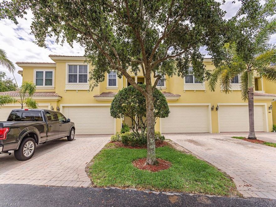 C.12435 Now priced below appraised value! Instant Equity! This very spacious two-story townhome is truly one of a kind. With over 2,300 sq ft of under air living space, this condo lives like a single family home. This 3BR+Den/3BA lake front residence epitomizes modern luxury with impeccable design and an open floor plan built to ensure ultimate comfort. Recently remodeled from top to bottom, upgrades are numerous and include: an updated stainless steel Samsung kitchen with granite countertops, new tile flooring on the lanai and maintenance free extra-long wide plank floors throughout first floor, recessed LED lighting, a new Ruud air conditioner and handler, a new 50 gallon water heater and expansion tank, and a home security system. In addition, this home boasts a spacious two-car garage. Nice and bright, this truly is one of the most attractive properties in all of Mariposa. Mariposa is a great community ideally situated just south of Pine Ridge road, in between Livingston and I-75.
