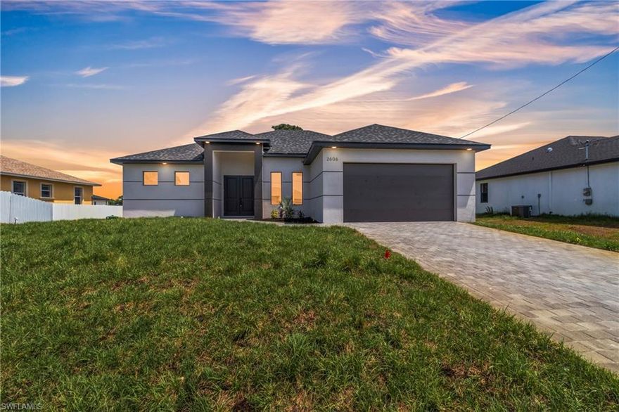 As you step inside, you'll notice the elegant touches that define this property. The kitchen is a true focal point, featuring exquisite quartz countertops that provide both, beauty and durability. The sleek stainless-steel appliances not only enhance the kitchen's aesthetics but also offer modern conveniences for cooking and entertaining. The interior design incorporates a touch of black and gold accents throughout, adding warmth and character to the living spaces. These wooden elements create a harmonious balance with the contemporary finishes, giving the home a unique and inviting atmosphere. Additionally, ceiling fans have been thoughtfully installed to enhance comfort and energy efficiency. The layout is functional and spacious, with three well-appointed bedrooms. The den adds versatility, serving as a home office or guest room.
The master bathroom features a shower plus his and her closet and sinks.