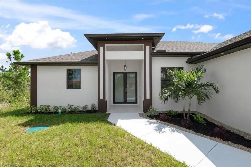 Welcome to this stunning 4-bedroom, 2-bathroom home on a spacious half-acre lot in Lehigh Acres. Enjoy modern living with a fully integrated SMART HOME SYSTEM, including control from your phone, watch, PC, or voice commands. The open floor plan features a bright great room with elegant tile flooring and tray ceilings, a formal dining area, and a kitchen with quartz countertops, large island, and plenty of cabinetry. Impact-resistant windows and doors provide safety and energy efficiency. Brand-new Samsung appliances, washer, dryer, and security cameras are included. Motivated seller offering incentives—move-in ready! 
----------------------------------------
Impresionante casa de 4 habitaciones y 2 baños en un lote de medio acre en Lehigh Acres. Cuenta con SISTEMA SMART HOME, plano abierto, pisos de porcelanato, cocina con encimeras de cuarzo y amplia isla, ventanas y puertas resistentes a impactos, y nuevos electrodomésticos Samsung. ¡Vendedor motivado—lista para mudanza!