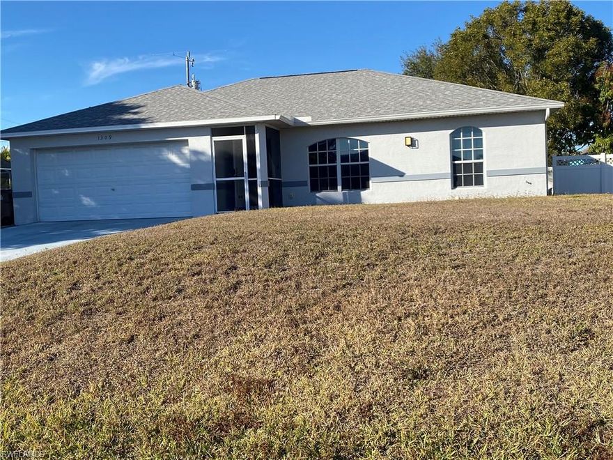A Great Value in Desirable SW Cape Coral. This 3 Bedroom and 2 Bath will invite you Home. You can Relax in Your Beautiful Home with Below Ground Pool. It features an Open Floor Plan with Cathedral Ceilings and a Split Bedroom Design.  Enjoy the Privacy of Your fenced in BackYard with unique Caged Pool. Wash away the "Heat of the Day" in "Your own Private Oasis"............ Your home is complete with City Water and Sewer, so you can feel Refreshed with cool Clean Water! The eat in Kitchen features plenty of Cabinet Space and Wood Laminate Floors. This Area is Convenient to All of Beautiful, Sunny, Cape Coral Florida: One of the Most Desirable Areas in the United States of America to live. Please Book Your own Private Viewing Soon. A Value like this will not last long!!!