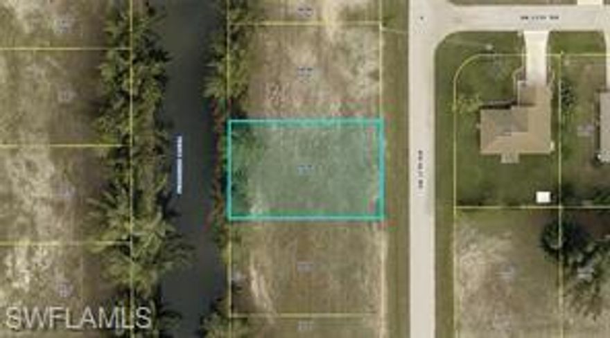Centrally located gulf access lot in beautiful Cape Coral! water and sewer in.
