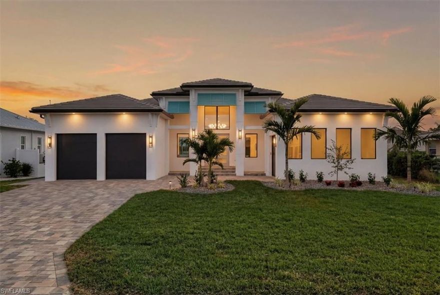 Welcome to 116 59th Terrace, a striking custom built waterfront residence designed for the most discerning buyer. Offering approximately 3,505 square feet under air, this luxury home delivers an exceptional blend of architectural sophistication, craftsmanship, and timeless coastal design.
From the moment you enter, you are greeted by an immediate WOW factor, highlighted by a dramatic glass wine display wall and expansive views through the great room toward the outdoor living space and tranquil water beyond. Every detail of the home reflects meticulous attention to design, flow, and finish.
The open concept great room, anchored by a custom fireplace, flows seamlessly into the chef’s kitchen, featuring top-of-the-line appliances, an extra large statement island, elegant custom cabinetry, and a hidden walk-in butler’s pantry, perfect for both everyday living and entertaining.
The home comes fully furnished with a complete designer selected interior, ensuring a seamless turnkey luxury living experience for immediate enjoyment.
This home offers four spacious bedrooms, each with its own private ensuite bath and walk-in closet, along with a glass-enclosed den and separate office with French doors, providing flexible spaces for work, relaxation, or hosting guests.
The primary suite is a true private retreat, complete with a cozy sitting area overlooking the pool, cabana, and water views. The spa inspired primary bath features refined finishes and a serene ambiance designed to impress and unwind.
One of the home’s most exceptional highlights is its seamless indoor/outdoor living experience. The expansive lanai showcases a resort style heated saltwater pool and spa, outdoor kitchen, and cabana, creating the perfect backdrop for entertaining or quiet waterfront relaxation.
The property is ideally positioned on a protected cove just off the river, offering beautiful water views while providing a natural buffer from open river conditions. This strategic placement delivers added peace of mind during storm season, while still allowing quick and convenient access to open water and the Gulf within minutes.
Built with durability and longevity in mind, the residence includes hurricane impact insulated windows and doors, a brand new 10-foot seawall, and an oversized dock system accommodating up to four boats. Boaters will appreciate the direct sailboat access with no bridges, making trips to open water effortless.
The location further elevates the lifestyle, with Tarpon Point Marina, Cape Coral Marina, and downtown Cape Coral all just minutes away,easily accessible by car or boat, offering dining, entertainment, and marina amenities at your doorstep.
This is a rare opportunity to own a thoughtfully designed luxury waterfront home that delivers protection, convenience, and refined coastal living crafted without compromise.