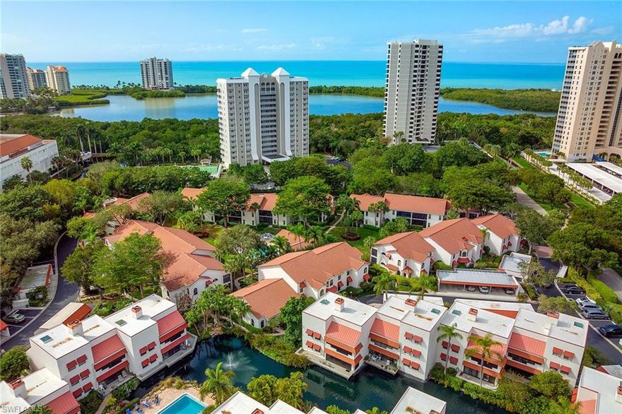 Preeminent beach lifestyle in highly sought after Pelican Bay. Two-bed, two-bath with sunny west exposure in the peaceful and lushly landscaped Serendipity. Step out your back door to one of two community pools.  Home features neutral tile floors/white cabinetry, upgraded bath and kitchen countertops, SS appliances, newer AC and washer/dryer, tankless water heater, brand-new piping throughout, laundry room w/sep sink, extra storage, spacious master bed suite w/walk-in closet, plantation shutters, 1 covered/assigned parking and lots guest parking. Enjoy 2 pools/2 spas, clubhouse and pool porch. Pelican Bay sets the bar when it comes to luxury beach living w/ exclusive amenities: private beachfront restaurants, attended beach service, miles of nature paths for biking/walking/fishing, 18 Har-Tru tennis courts, pro shops, full-service fitness center/group fitness, canoes, kayaks, sailing, wellness studio and nutrition/health services. Walkability! Steps to Waterside Shops/dining, Artis—Naples, Baker Museum. Central to downtown Naples, Mercato & Venetian Village. Furniture included w/staging exclusions. One pet allowed upon approval. REALTOR®, please read confidential remarks.