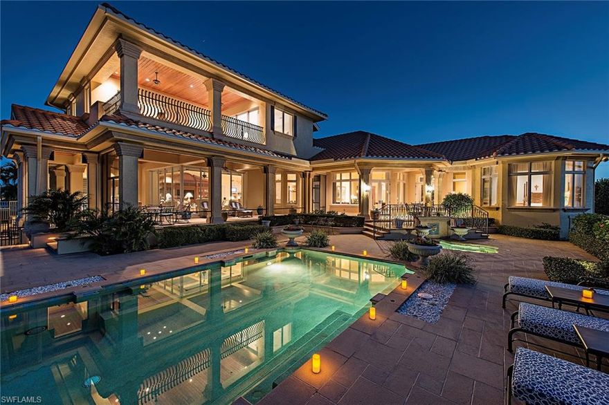 Luxury and elegance define this beautifully upgraded London Bay estate home featuring a dock with two boat lifts, quick direct access to the Gulf, and gorgeous lanai with pool, spa and water feature. This home is located on a private street in the prestigious Estates neighborhood of Marco Island and features upgraded tile flooring, a replaced pool heater and a brand new roof. This home is equipped with a whole house generator, impact glass, electric shutters, high-tech light control system and security system. The interior is decorated with coffered ceilings, crown molding, transom windows, custom window treatments, built-ins, custom mirrors, intricate tile flooring and wood flooring. Entertain effortlessly with the surround sound system, screened lanai with a fireplace and summer kitchen, and beautiful open pool and spa area. The gourmet eat-in kitchen features light cabinetry, tile backsplash, rich granite countertops, gas cooking, double wall oven and island. Additional features include two dens, two balconies, storage space, three car garage, and a bar with wine rack, wine cooler, ice maker, dishwasher and sink. Furnishings Negotiable and decorated by Romanza Interior Design.