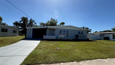 Photo of 21275 Austin AVE, PORT CHARLOTTE, FL 33952 (MLS # 226038456)