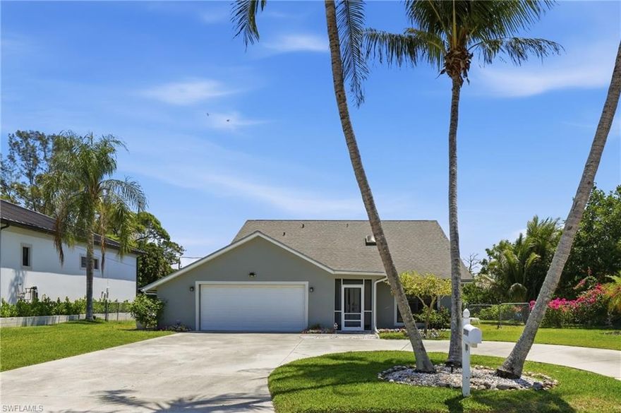 GULF ACCESS. NO HOA. 3 BED+DEN. 3 FULL BATHS. OVERSIZED GARAGE. JUST MINUTES TO THE HEART OF DOWNTOWN BONITA SPRINGS and on a street where vacant lots alone are selling for $400K+. Located just 3 minutes from Downtown Bonita Springs and local hotspots, with quick access to Coconut Point, RSW Airport, and SWFL's beaches, by car or by boat. Step outside to your oversized, fully fenced WATERFRONT yard lined with palm trees and 8 citrus trees.  Add your dream pool, expand your outdoor living, or simply enjoy the space. The expansive screened lanai opens wide to capture incredible breezes off the water, all overlooking your canal with DIRECT ACCESS to the Gulf of Mexico. Relax on your private composite deck, watch manatees pass by, or design your dock and lift, this is true Florida boating life right from your backyard. Inside, with over 2,000 sqft of bright, open living space designed for both comfort and entertaining. The main level features upgraded wood-look ceramic tile and porcelain flooring throughout, a spacious living room, formal dining area, and an additional  flex/entertaining space perfect for a second living area/game room. The kitchen has been completely redone equipped with newer appliances, quartz countertops, custom cabinetry, a large island, oversized 4-door pantry, and wine rack. A versatile main-level flex room with its OWN closet and PRIVATE garage access offers the perfect 4th bedroom, guest suite, office, or gym, with a full upgraded bathroom featuring a walk-in shower conveniently located nearby. Upstairs, you’ll find 3 oversized bedrooms plus a spacious loft overlooking the main living area, ideal for a media room, workspace, or additional living space. EVERY bedroom features sliding glass doors leading to a second-story balcony overlooking the canal, along with a private exterior staircase for easy access after a day on the water. The primary suite is bright and spacious with balcony access, generous closet space, and an upgraded en-suite bath with granite vanity and walk-in shower. The guest bathroom upstairs is also generously sized with updated finishes and a tiled tub/shower combo. Additional highlights include an oversized circular driveway, large garage with storage, an oversized laundry room with sink, cabinetry, and folding space, and extra storage throughout the home. NO HOA. NO RESTRICTIONS. DIRECT GULF ACCESS FROM YOUR BACKYARD. Perfectly located in a safe, highly desirable area, this home is ideal as a primary residence, vacation property, or investment opportunity with no rental restrictions. If you’ve been waiting for the full Florida lifestyle—by land and by water—this is it.