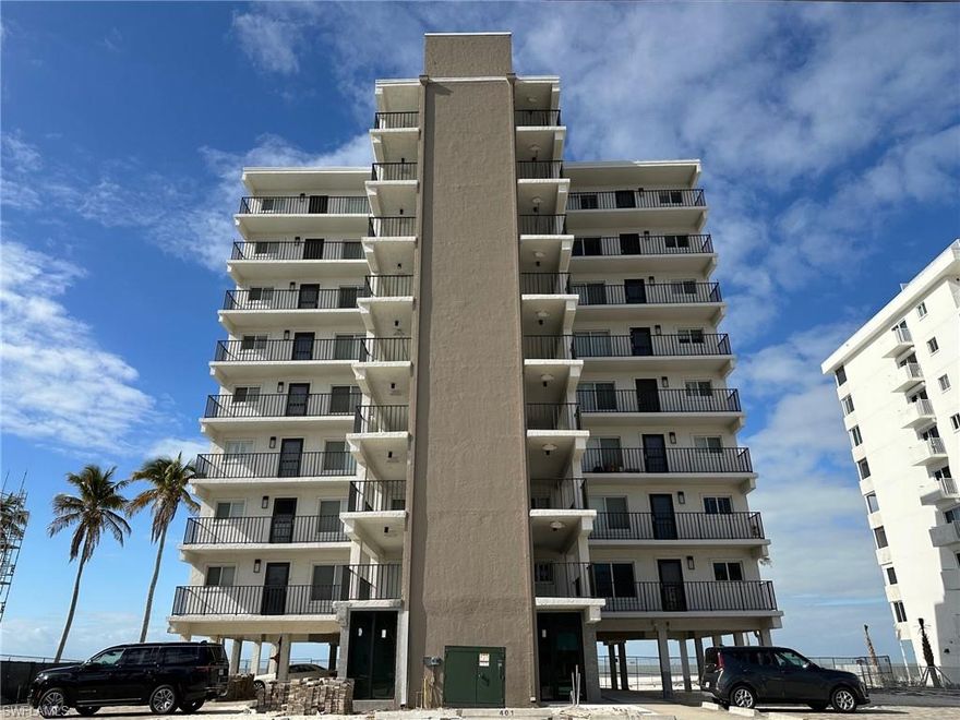 BEAUTIFUL BEACHFRONT 8th FLOOR END-UNIT CONDO ON BONITA BEACH WITH DIRECT GULF VIEW. 2 bedroom / 2 bath beach condo. Building repairs mostly finished including new elevator, new first floor common room and bathrooms.  Exterior finishes including landscaping, pool and brick paver parking lot will be completed soon. Welcome to your new happy place! Whether you prefer to watch endless sunsets with a glass of wine on the screened-in lanai or wake up to waves crashing on the beach, this condo is for you. This unique condo boasts beautiful views up and down Bonita Beach with phenomenal views of the GULF! New HVAC 2024. Windsong is a great beachfront condo, close to many restaurants, and a short drive to Naples and Fort Meyers Beach. 25 minutes to RSW airport. Windsong is the closest condo building on Hickory Blvd and Bonita Beach to the north of Doc's Beach House! Condo has hurricane impact windows and manual hurricane shutters on the lanai. Welcome to paradise!!