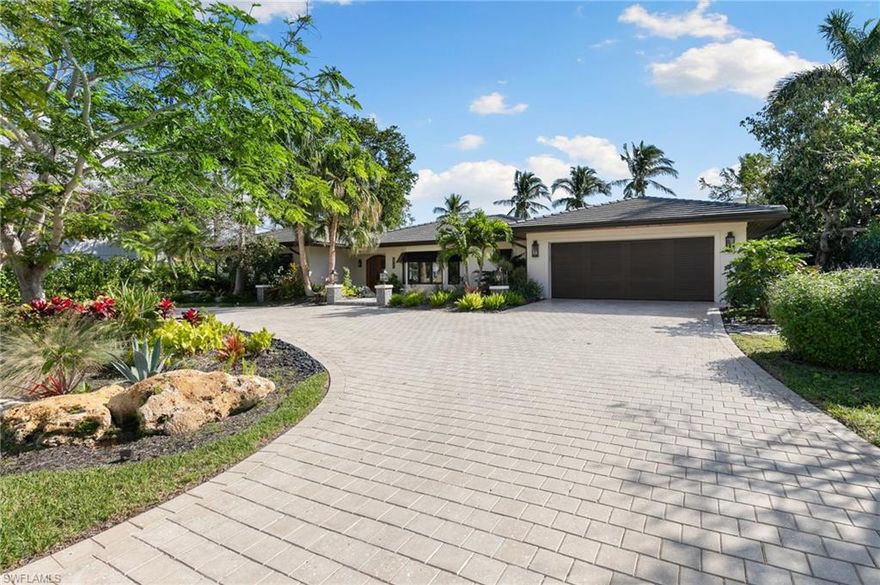 Welcome to this stunning estate home on Marco Island, fully remodeled in 2022. This exceptional property boasts 3 bedrooms, a den, a dedicated home office, 4 full bathrooms, and 1 half bath, all set on a prime Gulf-access lot. With no bridges and a coveted southeastern rear exposure, this home offers seamless access to open waters and breathtaking waterfront sunrises. As you step inside, you’re greeted by a blend of coastal elegance and modern design. The open-concept layout is adorned with unique decorative ceiling beams, elegant gold hardware, and French doors that bathe the living spaces in natural light. The chef’s kitchen is a masterpiece with quartz countertops, high-end appliances, a pot filler, and a fully equipped dry bar—ideal for entertaining. The hidden laundry room and custom closet cabinetry add an extra layer of sophistication and functionality. Outside, paradise awaits with an expansive screened lanai, a private pool and spa, and a covered seating area featuring custom wood ceilings. The outdoor kitchen with a tiki bar and three charming chickee huts make this space a true entertainer’s dream. Boating enthusiasts will appreciate the 20,000 lb large lift, a second 6,000 lb lift, and an additional platform lift with a 4,500 lb capacity, all set against a 2022 seawall. The lush, professionally landscaped grounds with custom paver pathways create a serene, resort-like atmosphere. Hurricane impact windows and doors provide peace of mind, while the in-ground propane tank ensures year-round comfort. Furnished and move-in ready, this property is more than a home—it’s the ultimate Southwest Florida lifestyle. Don't miss this rare opportunity to own a piece of paradise!