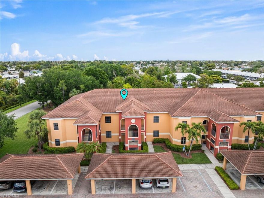 Live where every day feels like a getaway at 13651 Julius Way #1422. This second-floor condo places you right in the heart of South Fort Myers, just about 8 miles from the sugar-white sands of Fort Myers Beach—close enough for spontaneous sunset trips, with the added convenience of the seasonal trolley making beach days effortless.

Step inside to a fresh, move-in-ready space featuring all-new flooring installed in March 2026. The interior is exceptionally clean and offered turnkey—pack your clothes, grab your toothbrush, and start enjoying life from day one. Your private screened lanai overlooks lush, manicured landscaping, creating a peaceful spot for morning coffee or unwinding after a day in the sun.

The gated community is beautifully maintained and designed for an active, social lifestyle. Residents enjoy a resort-style pool, fitness center, and BBQ area perfect for gathering with friends and neighbors. A covered carport keeps your vehicle protected year-round, and maintenance fees simplify ownership by covering water, basic cable, internet, and exterior pest control.

Location is where this condo truly shines. Just off McGregor Blvd, you’re surrounded by some of the area’s favorite dining spots—Crave, Roadhouse Café, McGregor Grill, and the beloved University Grill are all nearby. Quick access to downtown Fort Myers opens the door to a vibrant riverfront scene filled with live music, art walks, boutique shopping, craft breweries, and an ever-evolving lineup of restaurants and events.

Whether you're looking for a seasonal escape, an income-producing property (up to 12 rentals allowed per year), or a low-maintenance full-time residence, this condo delivers flexibility, convenience, and a lifestyle that keeps you close to everything Southwest Florida is known for.