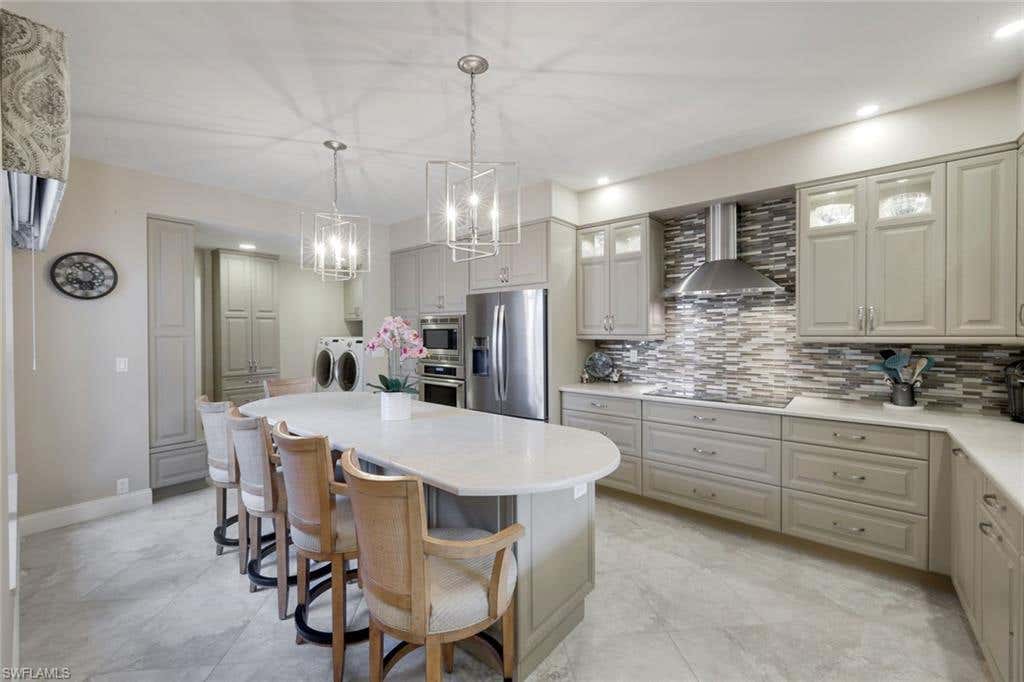 Photo of 11594 Quail Village WAY, NAPLES, FL 34119 (MLS # 226028109)