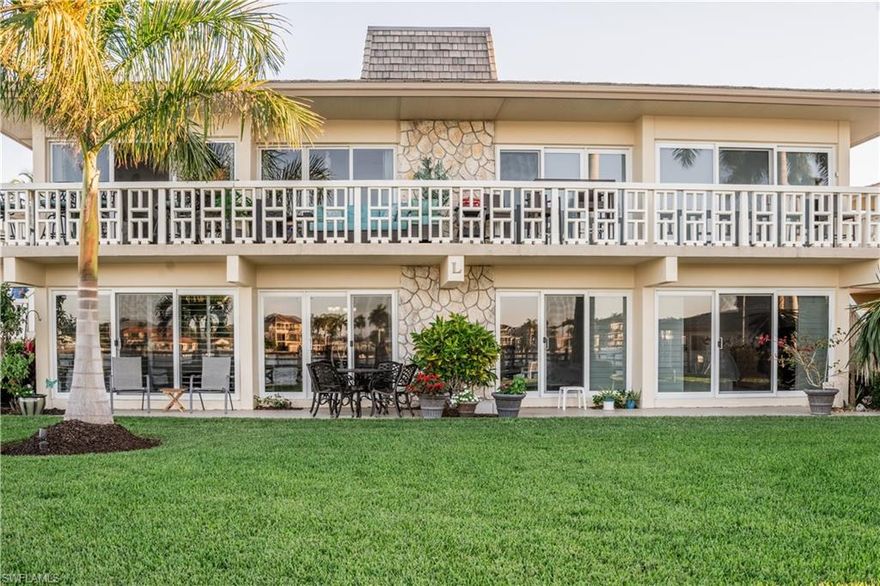 DON'T MISS THIS RARE OPPORTUNITY, Out of 100 total units in Ville De Marco, this is one of only 8 double units and the only double unit currently for sale that offers unprecedented wide-water views of the Marco River FROM EVERY ROOM! Fully remodeled from the most discriminating owners, every detail has been accounted for to allow maximum lighting, exceptional wide water views, thoughtful utilization of all available space, and top of the line upgrades. Remodel incorporates hurricane doors, windows and sliders; custom kitchen cabinets; upgraded appliances, including an induction stove and built-in air fryer; master bedroom features a walk-in closet; first bathroom features a jacuzzi tub; second bathroom has full rain head/body spray shower heads; full water filtration system; floor-to-ceiling pantry; plus plantation shutters and custom crown molding throughout. The unique layout includes a full laundry room with wet bar and a second full-size refrigerator and Bosch washer and dryer. The walk-out patio is spacious, inviting, and provides extraordinary wide water views of the Marco River. The community offers boat slips available for lease, a fishing pier, and a water-front clubhouse, all for your enjoyment. Unit location is on the quiet side of the complex, away from night-time restaurant music and noise, but still within walking distance to all restaurants in the area—AN IMPORTANT QUALITY OF LIFE POINT NOT TO BE OVERLOOKED! Experience the MILLION DOLLAR VIEW from a unit that has all the convenience of a condo but lives like a water-front home.