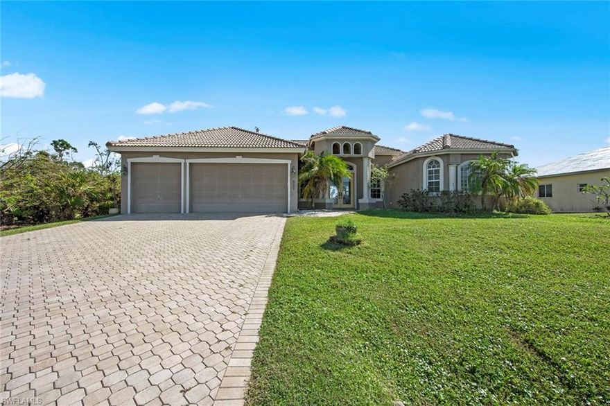 Beautiful Freshwater Pool home with over 2,200 of living space. Move in ready for you featuring 3 bedrooms plus a den - 3 car garage and open great room that makes this a perfect home for entertaining! Tile throughout the home high ceilings, crown molding, granite, upgraded appliances. Step outside to the large under truss lanai (with automatic storm shutters) overlooking the pool and canal with plenty of room for entertaining! Beautiful landscaping that has been well maintained with a walkway to the dock and boat lift. Minor damage from Hurricane Ian.