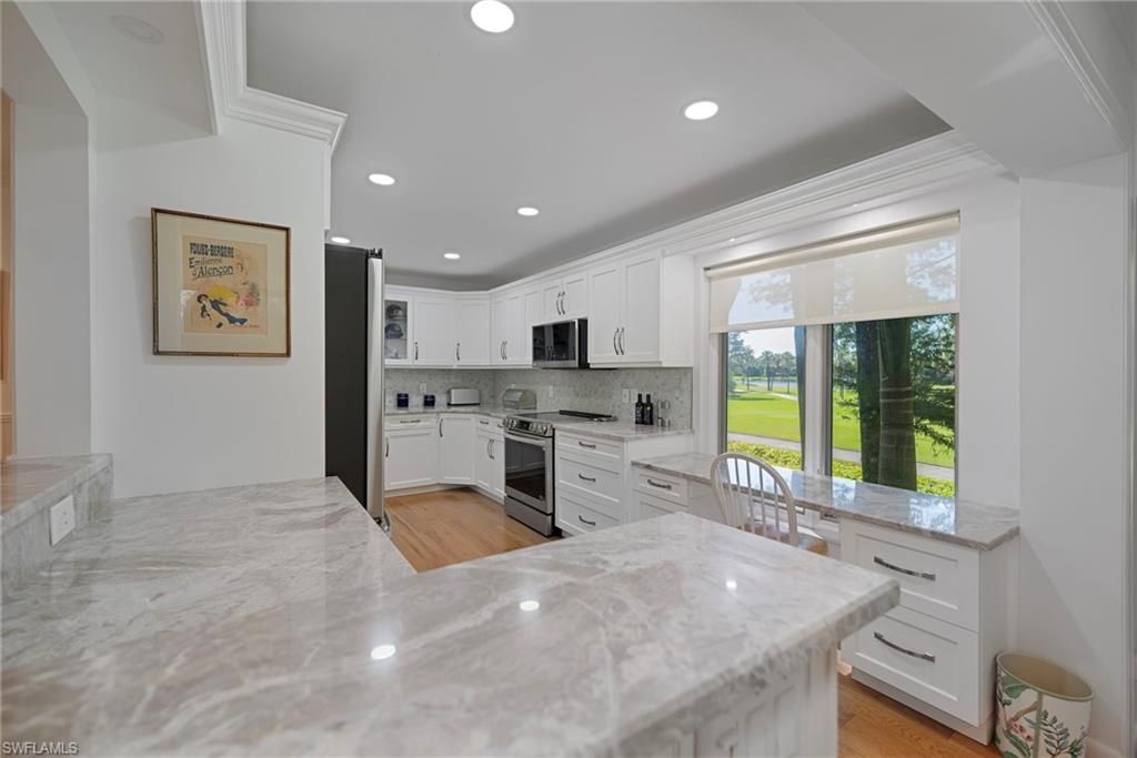 Photo of 104 Wilderness DR #241, NAPLES, FL 34105 (MLS # 225083756)