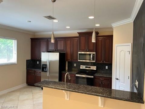 Townhouse in ESTERO FL 10221 Olivewood WAY.jpg