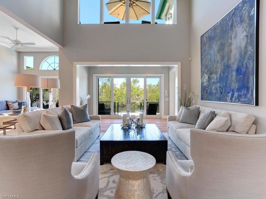 V.2657 - Comparable to a new coastal contemporary home & without equal in Bay Colony, this stunning light-filled waterfront residence effortlessly blends today’s modern amenities with the finest of furnishings and finishes. Fully re-imagined and superbly renovated by a renowned Naples builder for open concept carefree living it features Andersen Impact windows and sliding doors, Wolf and SubZero appliances, Grabill custom cabinetry, a Yamaha sound system, wide plank flooring, new roof & hurricane shutters. Step down from an expansive patio into a sparkling gas-heated saltwater pool & spa surrounded by shell stone decking & sunny lounging areas. Facing Upper Clam Bay, this Vizcaya villa boasts glorious sunset skies and is perfectly situated in this picturesque dog-friendly neighborhood located in the exclusive gated enclave, Bay Colony. Enjoy a luxury lifestyle with private beach access, attended service, tennis courts and a fabulously remodeled Beach Club and restaurant set within SWFL's most desired beachfront community, Pelican Bay. The Waterside Shops & Artis-Naples border the south and the Ritz Carlton the north, along with two additional private beach restaurants on the Gulf.