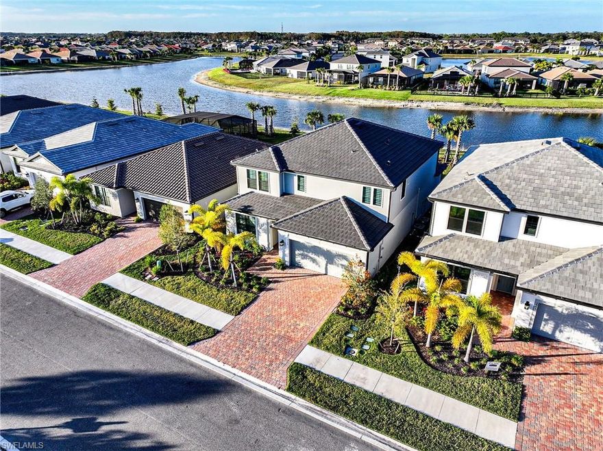 Welcome to Hampton Lakes at River Hall, a gated community offering safety, comfort, and resort-style living. This spacious two-story home features 5 bedrooms, 3.5 bathrooms, and a 3-car garage, thoughtfully designed with an open-concept layout, abundant natural light, and generous storage throughout. The home includes hurricane-impact windows, smart-home wiring, cable-ready connectivity, and an EV charging outlet. Located in a family-friendly neighborhood, this property provides a peaceful setting while remaining just minutes from shopping, dining, schools, and a short drive to Fort Myers. Community amenities include a clubhouse, fitness center, tennis and pickleball courts, basketball court, playground, and a large resort-style pool. Pet-friendly with approval and deposit required. Move-in ready and available now.