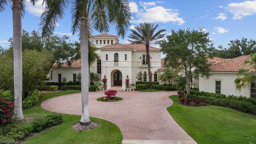 H.14394 -Situated on one of the most exquisite sites in all of Quail West, this stunning home sits on over one acre and offers long water and golf course views from every breathtaking angle. With over 7500 square feet, this NEWLY EXTERIOR PAINTED (2019) 2-story 5 bedroom, 5 full and 3 half bath spacious estate with private elevator offers custom rooms to fit your every need. A state-of-the-art media room with starlit ceiling, huge fitness studio, wine room, gourmet kitchen and guest room with fireplace is complemented by a a second floor loft family room, access to 2 guest suites one with a private balcony and gorgeous sunset views. The expansive and inviting lanai with a number of covered lounge areas offers a full kitchen, fireplace and inviting pool and spa with water features and fire bowls. A grand entrance with circular drive and porte-cochère gives way to a 4.5 car garage and flowing pathways. Enjoy a grand lifestyle in the friendly and welcoming community of Quail West.