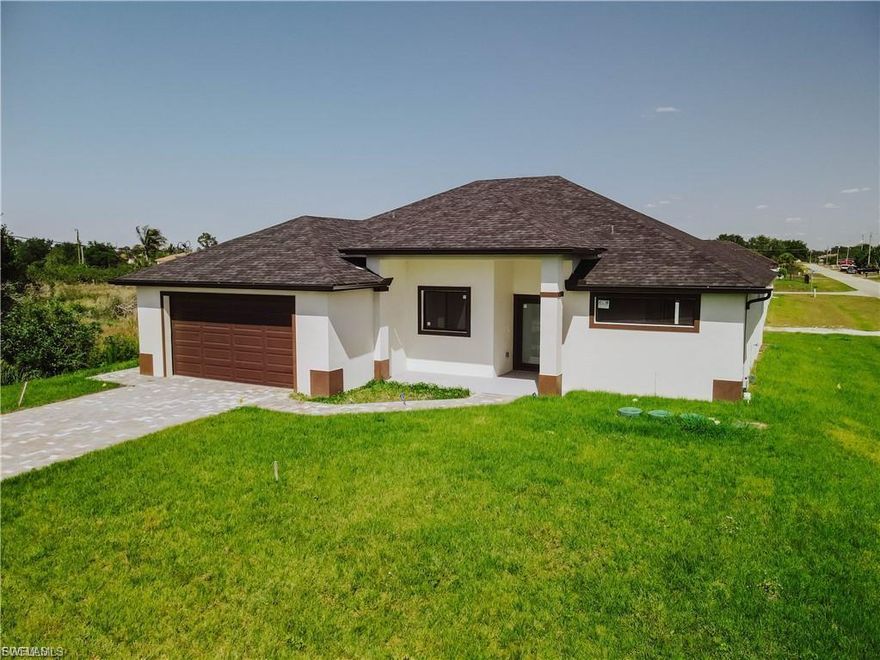 Step into modern comfort with this brand-new 3-bedroom + den, 2.5-bath home, offering 1,812 sq ft of thoughtfully designed living space. Located on a quiet dead-end street and sitting on a spacious corner lot, this home combines style, functionality, and privacy. From the moment you walk in, you're greeted by a bright open floor plan and tile flooring throughout, adding a clean and upscale touch to every room. The kitchen is a standout with granite countertops, quality finishes, and plenty of space for hosting or everyday living. A flexible den provides the perfect spot for a home office, guest room, or creative space. The laundry room adds convenience, while the 2-car garage