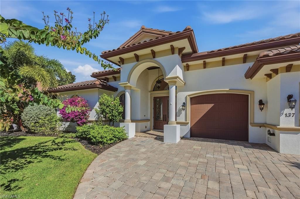 Photo of 137 Hollyhock CT, MARCO ISLAND, FL 34145 (MLS # 226006204)