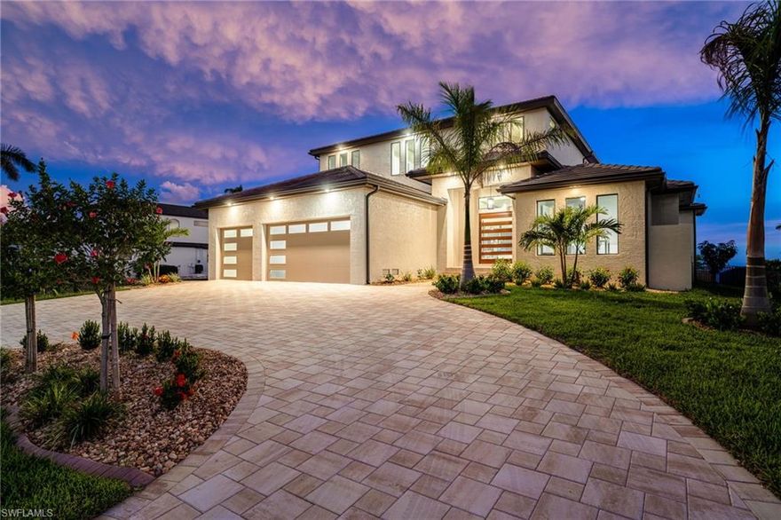 Location, Location, Location!!
Elegant, Modern, Welcoming, Coastal Contemporary New Construction 2-Story Estate Home located on Dolphin Drive.
Dolphin Dr is one of the few Streets in Cape Coral overlooking the widest portion of the River with Southern Exposure and the only Street this close to the Beach and upcoming Restaurants and Yacht Club
Southwestern rear Exposure for this Home offering the most daytime Sunlight and outstanding Sunsets across Miles of open Water! 
This custom built 2-Story Home features unobstructed Views, an open and very modern Floor Plan with lots of natural Light.
24ft wide double pocketing sliding Glass Doors for opening your Indoor Living Area to the Outdoor Lanai and stunning oversized Pool with Spa. This Home features 5 Bedrooms and 4.5 Bathrooms, 12 ft first Floor Ceilings and 10 ft Second Floor Ceilings.
10ft brand-new Seawall. Gorgeous new 100 Foot Dock w/seating Area and Sun Deck along with a 16,000 lb. Boat Lift.