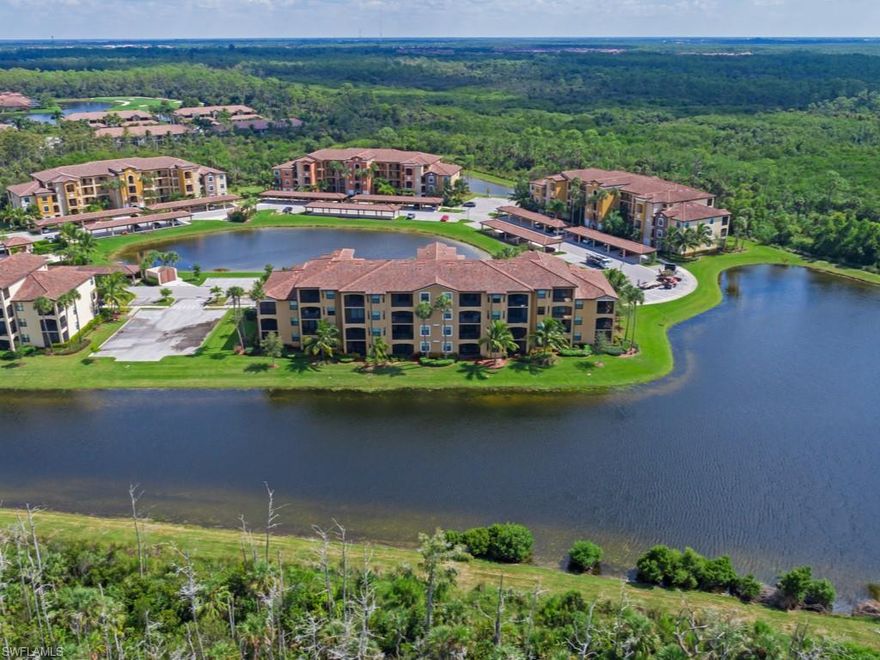 TREVISO BAY.  GIAVENO is located within walking distance of the TPC Golf Course and Clubhouse. GOLF AND ALL AMENITIES INCLUDED. This light and bright 1st Flr Bellini Unit offers 2 BR 2 BA, living room, dining area, breakfast nook, screened lanai, kitchen with stainless steel appliances, granite counters, crown molding, tile floors, carpet in bedrooms. In-home Laundry. Detached carport and guest parking. Separate large exterior storage unit. Enjoy the spectacular lake and preserve views from the screened Lanai. The community pool and BBQ area are a few steps away in the cul-de-sac. PET FRIENDLY NO WEIGHT LIMIT. Quiet neighborhood adjacent to the Rookery Bay Preserve filled with wildlife. Enjoy 2 Clubhouses, fitness center, beauty center, tennis, pickleball, basketball, bocce ball, jogging, walking, biking, cycling, fishing, yoga, swimming. Plenty of dining options available. Close to back gate for quick access to US41 and just minutes from downtown Naples and Marco Island for fine dining, shopping, movies, beaches, parks and galleries. Course reopening November. A traffic light is planned at the main Treviso Bay entrance. Your piece of paradise awaits!  AGENT SEE REMARKS.