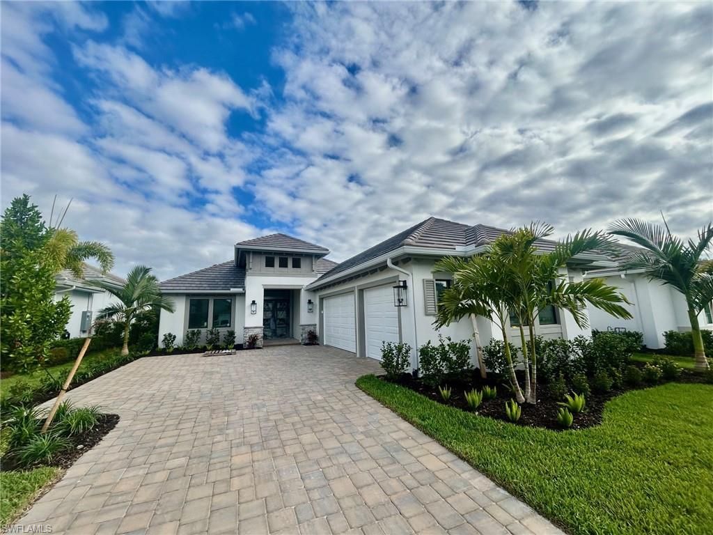 Photo of 9716 Moonflower LN, NAPLES, FL 34114 (MLS # 226015309)