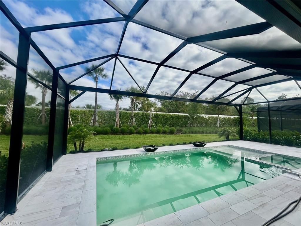 Photo of 9716 Moonflower LN, NAPLES, FL 34114 (MLS # 226015309)