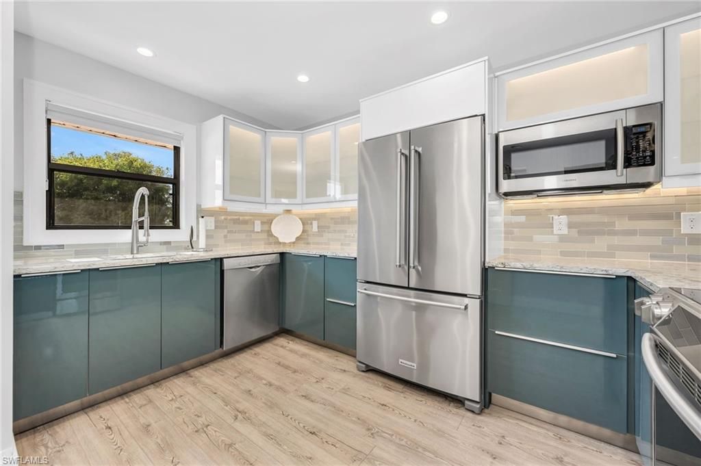 Photo of 1100 9th ST S #C201, NAPLES, FL 34102 (MLS # 225082356)