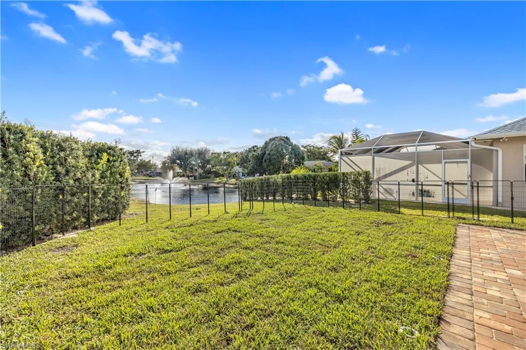 Photo of 11141 Palmetto Ridge DR, NAPLES, FL 34110 (MLS # 226005706)