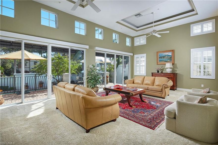 This is the perfect investment opportunity!  6 car garage/5 bedrooms/ 2 legal parcels which could be separated and the ideal storage room for an owners closet in each unit ready for the Naples vacation renter and all just three blocks to the glistening sands of the Gulf Shore beach or to 5th Ave S.  Combined as one unit, this villa is currently set up with dual kitchens, elevators and five bedrooms plus den offering nearly 5,000 SqFt of interior living space.  Soaring ceilings and copious amounts of glass allow the natural, southern sunshine to fill the rooms providing a warm and inviting atmosphere.  The spacious front courtyard is wonderfully charming and offers an amazing 21ft pool; ideal for fun in the sun or winding down watching the sunset skies. Car enthusiasts will be thrilled with the attached garages with space for 6 cars with private alleyway access.  Nicely maintained, plenty of space for family and friends, generous rental policy and all located in the heart of Olde Naples.