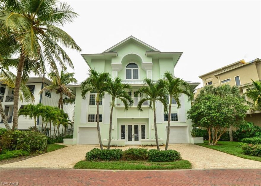 Dramatic gulf views from this 3-story Barefoot Beach home.  Recent 2014/2015 home renovation.  Features include new roof, impact windows, volume ceilings, private elevator, wood flooring, fireplace, electric shutters and screens.  Freshly painted exterior. Barefoot Beach Gulf home amenities include clubhouse with fitness, gathering room, lighted basketball and 2 Har-Tru tennis courts. Optional beach club membership available as well as dock lease & dock purchase. Fantastic home!