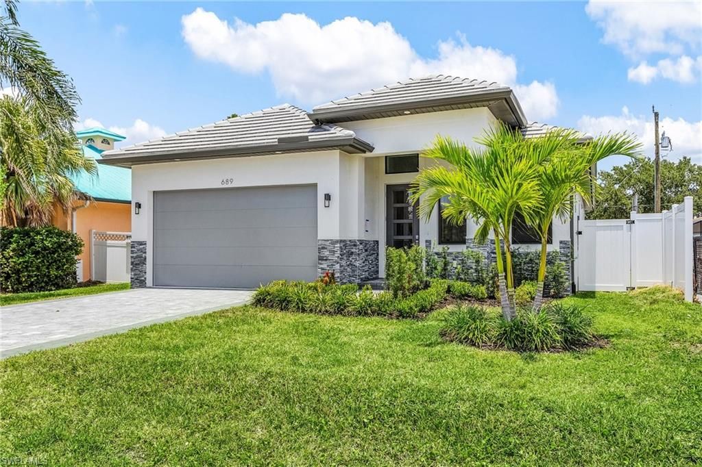 Photo of 859 108th AVE N, NAPLES, FL 34108 (MLS # 226011400)