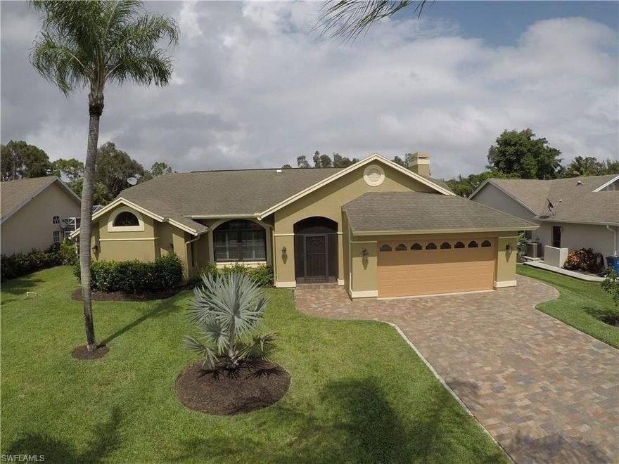 Take a look at this beautifully updated 4 Bedroom, 3 Bath, Heated Pool Home with 2 Car Garage. New paver driveway and walkways, screened entryway, beautiful wood flooring through the main living and bedroom areas with brand new travertine tile in the Kitchen and Baths. The Kitchen and Baths have been remodeled with lots of granite. You'll also find a Family Room, Living Room, Breakfast Bar with Nook overlooking the new Pool and Lanai. The salt water Pool was added in 2015, with electric heat and solar heat. Large pavers cover the pool deck plus a nice covered lanai for entertaining. The Master Bath offers two walk in closets, separate granite shower, spa tub and dual vanities. Additional features are new Pella Windows, Plantation Shutters, Fireplace, Vaulted  Ceilings, Crown Molding, and the home has been all freshly painted inside. New landscaping including fruit trees. Dead end street, so no through traffic. Great location, close to shopping, Ft. Myers beach, Sanibel and Captiva Islands. Come see this home, you'll be happy you did!