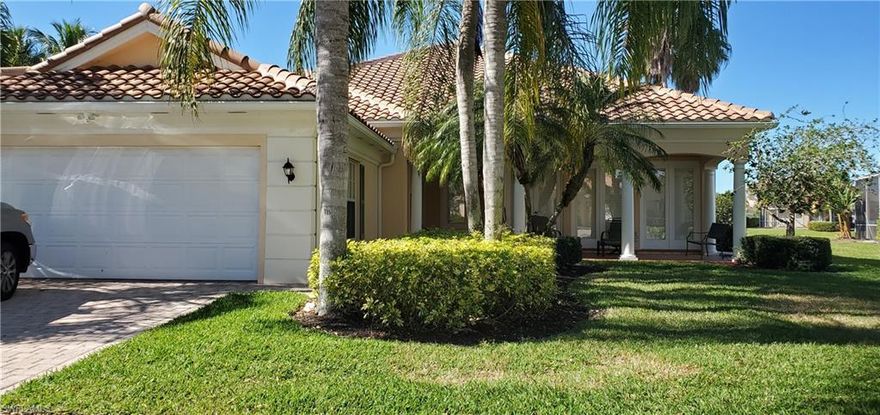 Lowest priced Carlyle Model currently for sale in Island Walk.  New Roof in 2018.  The home has 4 bedrooms plus Den, and 3 full bathrooms.  This well cared for original owner home has great lake views with southwestern exposure.  Features include: a custom pool and spa with large water feature, roll down hurricane shutters on the rear of the home and hurricane panels on remaining windows/doors.  Updating includes: newer appliances, newer tankless hot water heater, newer door hardware, granite countertops in the kitchen, laundry and one bathroom, newer fans, newer a/c unit, and newer vinyl "wood look" flooring throughout the main living areas.  Other features include electric fireplace, central vacuum, and plantation shutters.  This one won't last long.