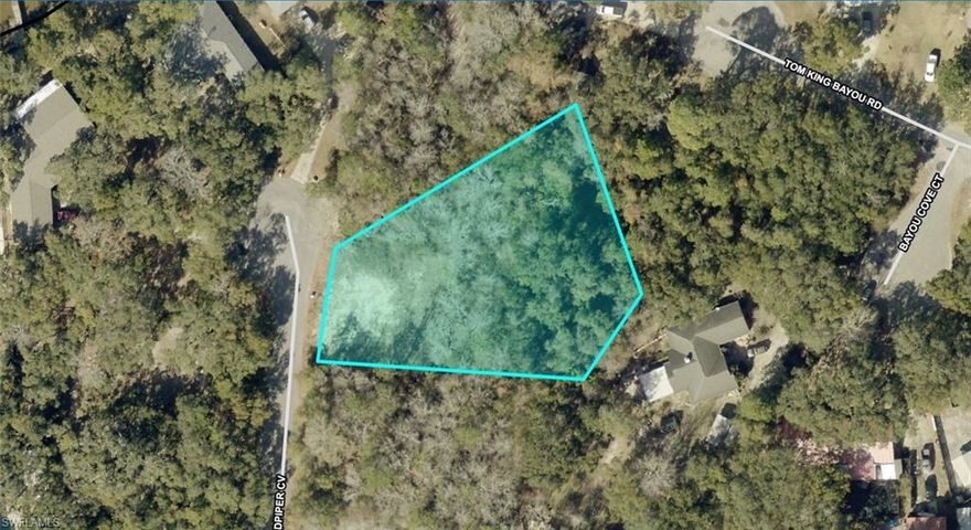 Build-ready 0.7-acre residential lot located in Mossy Cove, Navarre, FL, with convenient access to East Bay and Pensacola Bay. This cleared and level parcel is situated on a paved cul-de-sac, offering privacy and a desirable setting near the water. The property has been fully surveyed for single-family residential construction, with wetland mitigation credits already paid. Utilities are available, including city water, power on site, and septic drainage. 

Zoned R1 for single-family residential use. No HOA. This lot presents a rare opportunity to move directly into the building phase without the typical delays associated with entitlement, mitigation, or site preparation. Buyers are encouraged to verify all information, including zoning, utilities, and building requirements, with the appropriate authorities.