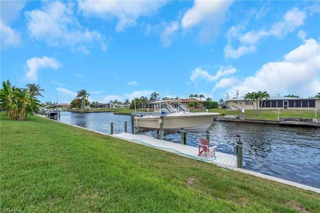 Photo of 1638 SE 28th ST, CAPE CORAL, FL 33904 (MLS # 226016065)