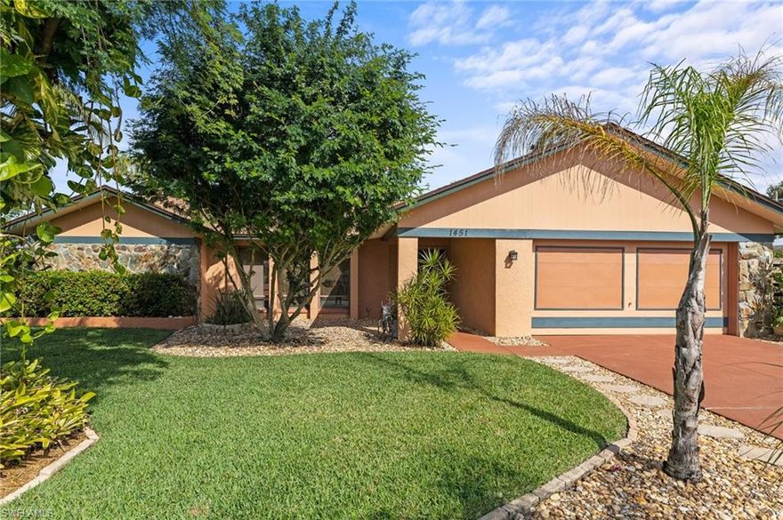 Well maintained home in the sought after Whiskey Creek neighborhood! This beautiful three bedroom two bathroom home features vaulted ceilings, a working fireplace, and a meticulously maintained backyard. Step out into your own private oasis with pool, hot tub, and screened lanai that overlook the mature landscaping and creek. Additional features include a new roof (2021), new pool pump (2020), sprinkler system (2021), two whole home generator hookups, and plenty of garage and outdoor storage. The community boasts a public golf course and clubhouse and is minutes from shopping, dining, and the Southwest Florida beaches.