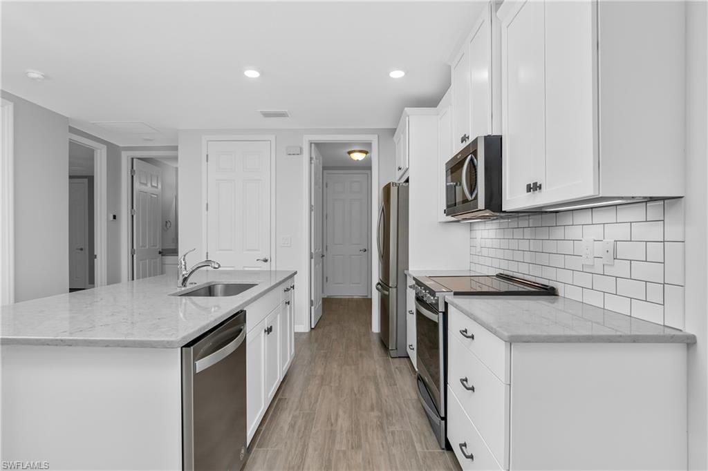 Photo of 14559 Edgewater CIR, NAPLES, FL 34114 (MLS # 226014494)