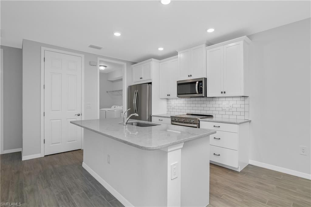 Photo of 14559 Edgewater CIR, NAPLES, FL 34114 (MLS # 226014494)