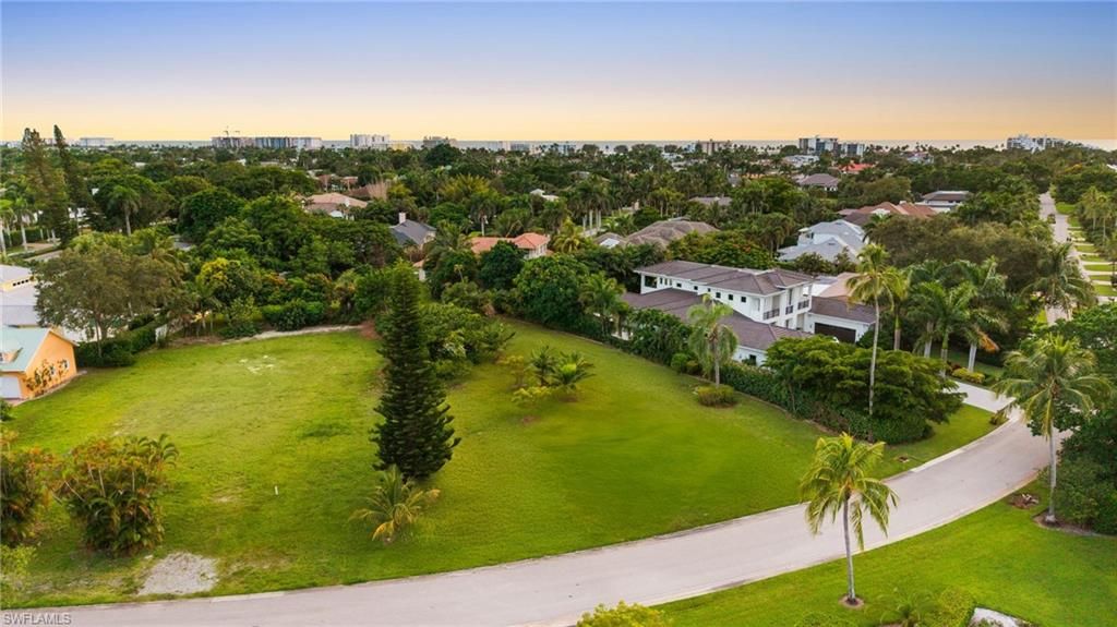 Photo of 700 BOW LINE DR, NAPLES, FL 34103 (MLS # 225068435)