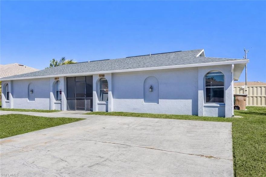 This right-side duplex unit has just completed a full modern overhaul, giving you the rare opportunity to enjoy a space that hasn’t been lived in since its improvement. Step into a freshly transformed 2-bedroom, 2-bath residence in the heart of Cape Coral where everything feels crisp, clean, and untouched. Inside, you’re welcomed by sleek new plank flooring throughout and a bright, contemporary kitchen designed to stand out. Featuring quartz surfaces, stainless steel appliances, custom tile detailing, upgraded cabinetry, and stylish recessed lighting that elevates the entire space. The primary bedroom offers generous proportions, a large closet, and a beautiful high-end bathroom with updated tile work and a glass-enclosed walk-in shower that feels straight out of a model home.  Main bathroom has elegant tiles in the shower and a custom lit mirror. Practical upgrades include interior laundry hookups, city utilities already in place, and added storage with a private exterior closet. Out back, you’ll appreciate a spacious screened lanai that opens to a fenced yard; separately enclosed for added privacy. Located near everyday conveniences like Shopping, Restaurants, Schools and Parks. Situated in Flood Zone X for added peace of mind. If you’re looking for something modern, polished, and completely refreshed; this is the one to see.