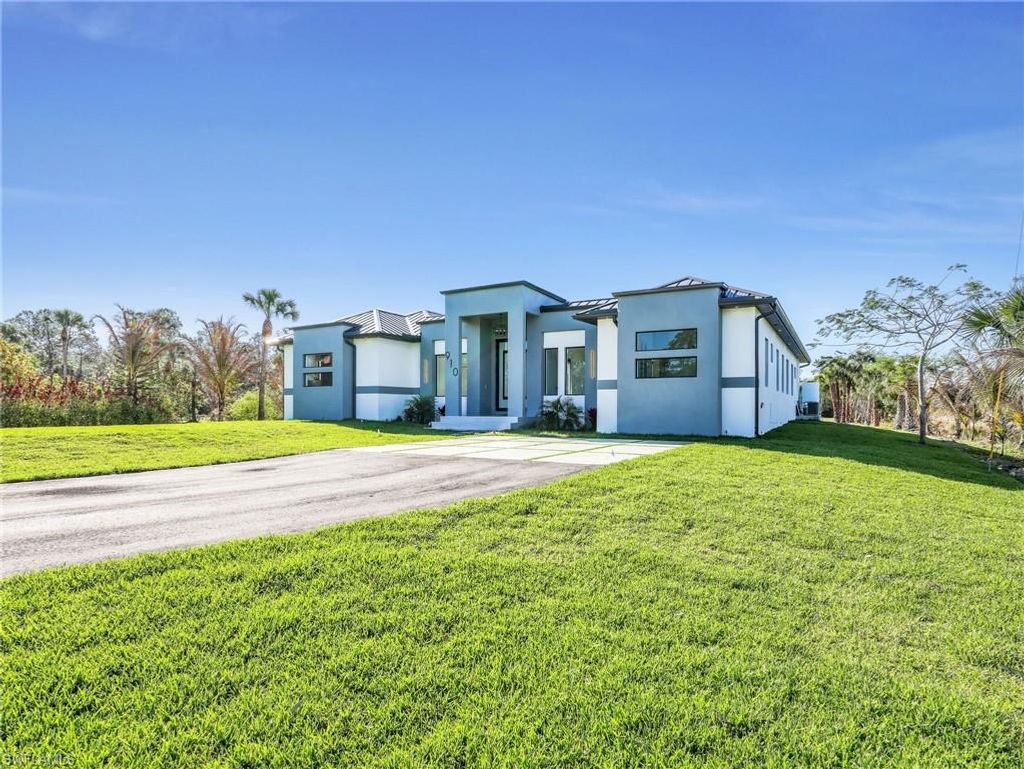 Photo of 910 Golden Gate BLVD E, NAPLES, FL 34120 (MLS # 226011056)